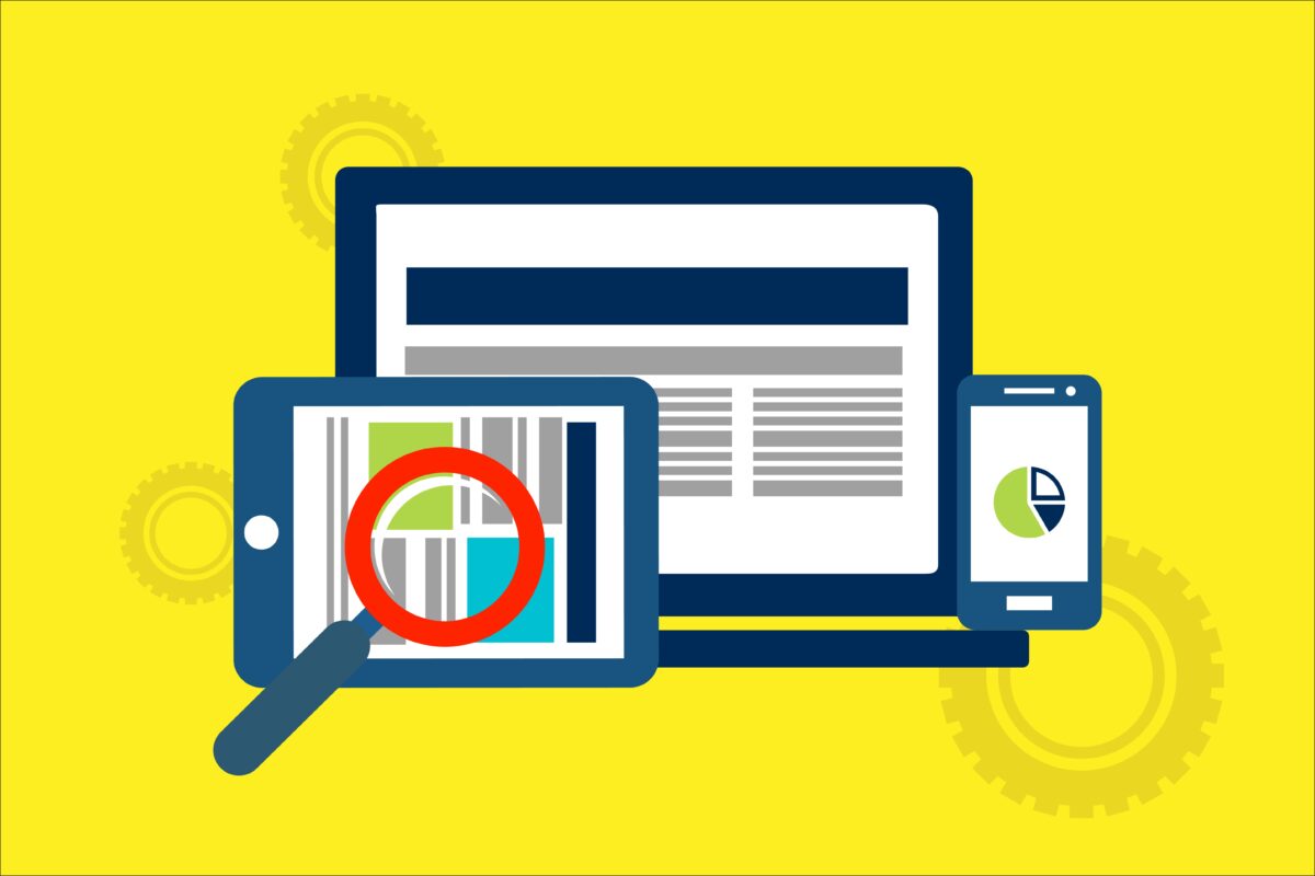 Illustration of a phone, tablet and laptop with a magnifying glass.